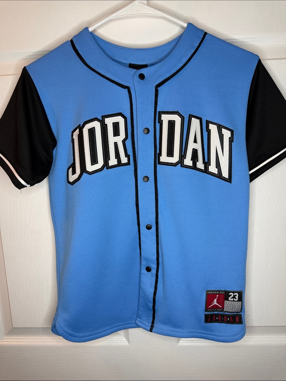 Jordan Blue and Black Baseball Jersey with Bold Lettering
